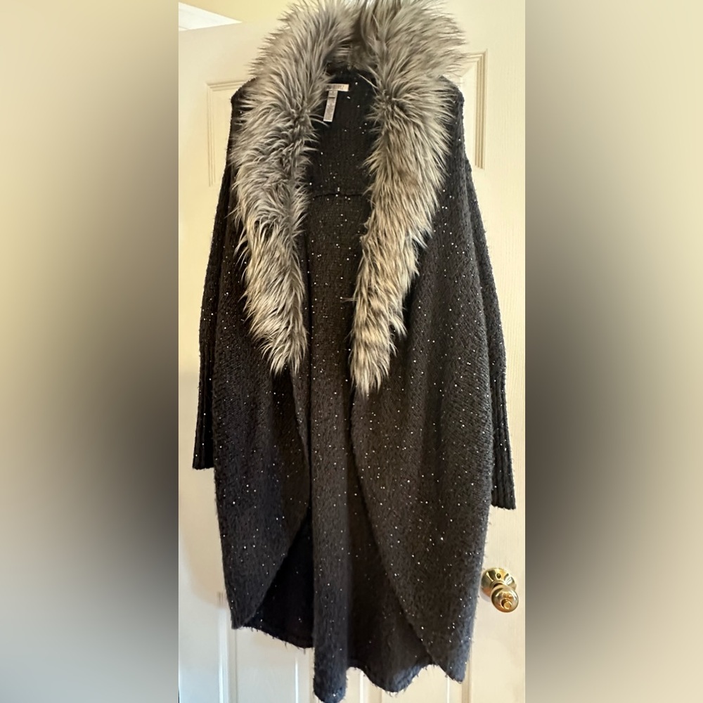 Jennifer Lopez fur trimmed gray, long cardigan sweater, or duster.